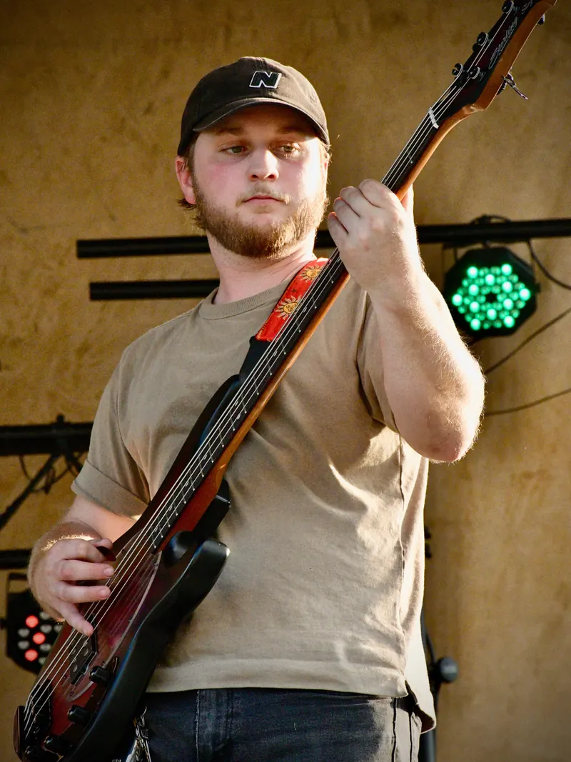 Bassist on the outdoor stage